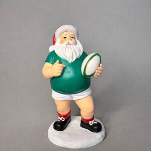 Santa in green jersey with rugby ball 16cm
