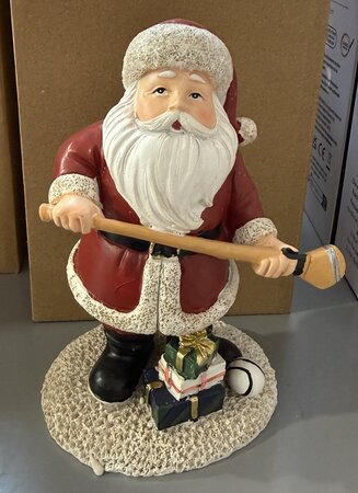 Santa with hurling stick 10x8x15cm